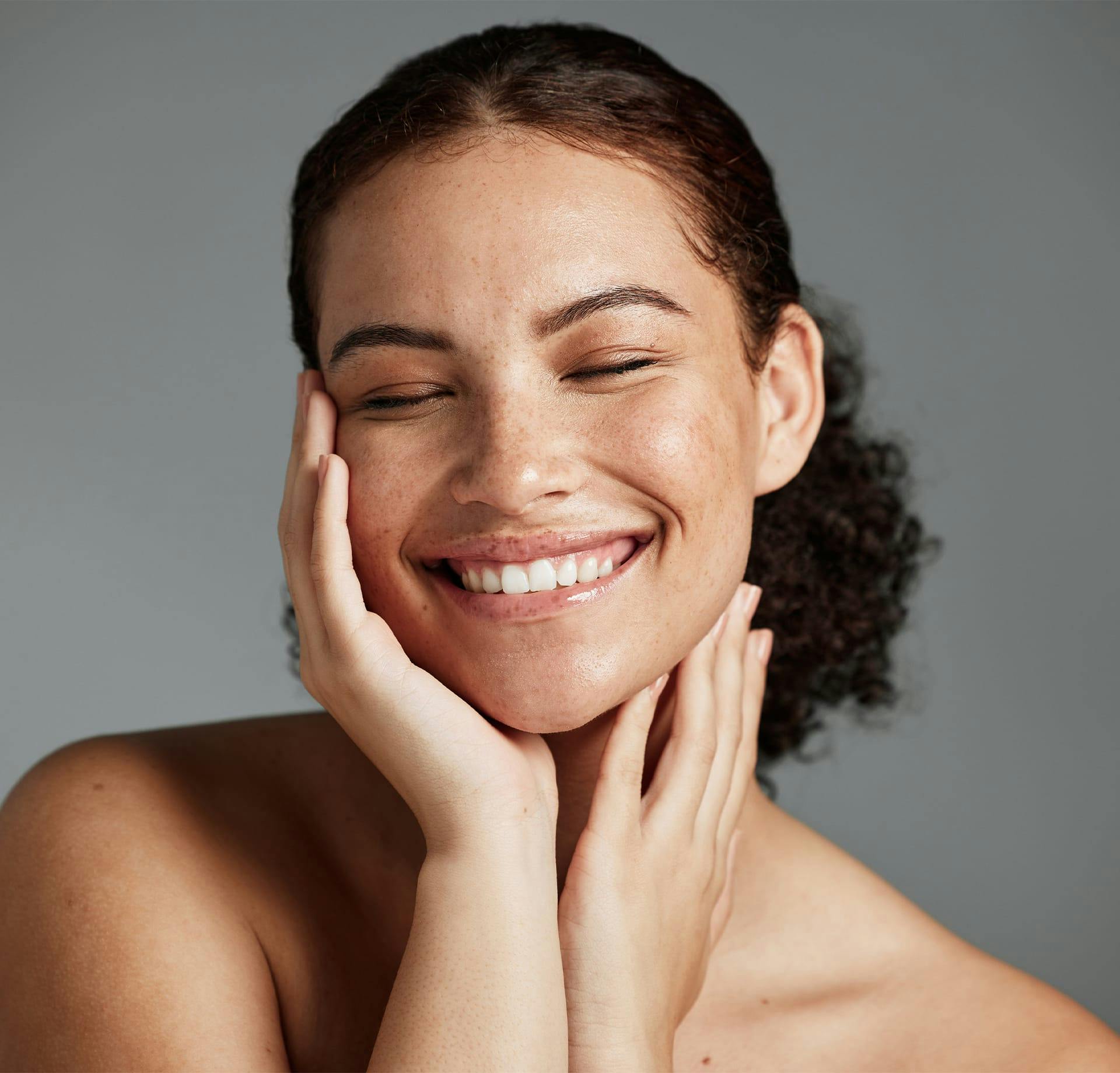 Smiling Holding IPL: Transform Your Skin with Advanced Treatment in Boston